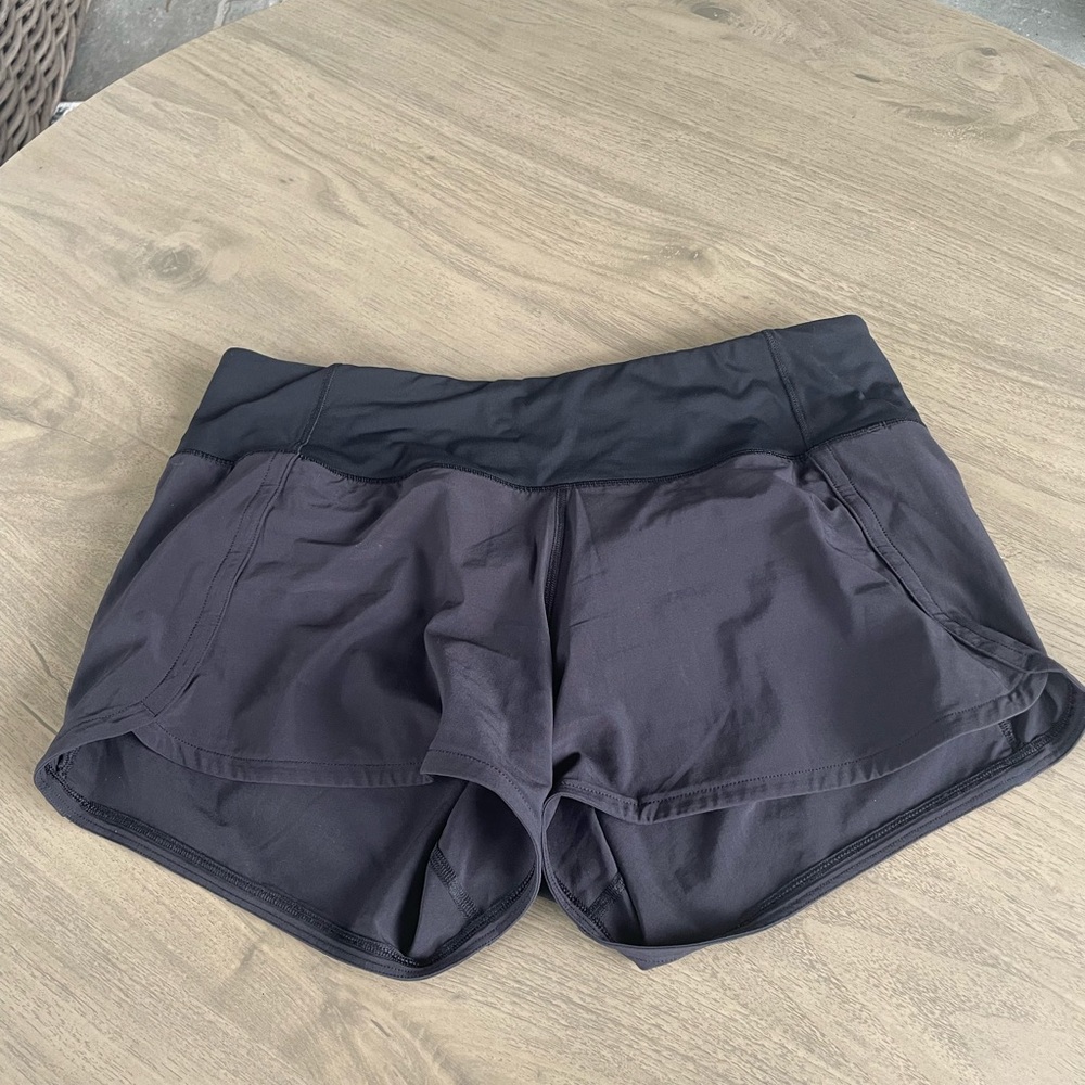 Black lululemon speed up shorts 2 inch inseam.